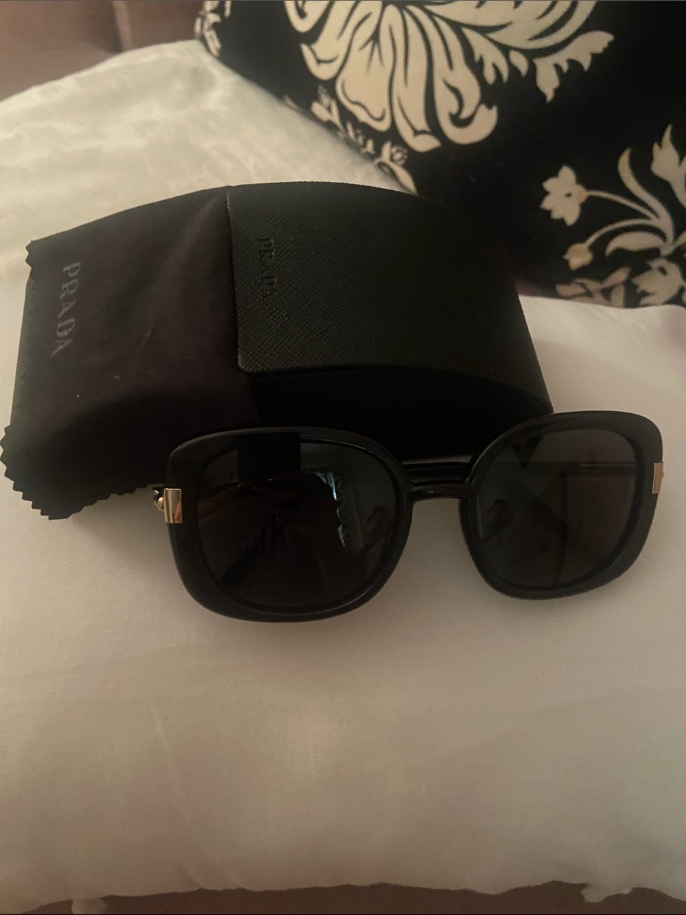 Prada Black Oval  Sunglasses with Dark Lenses
Authentic with case